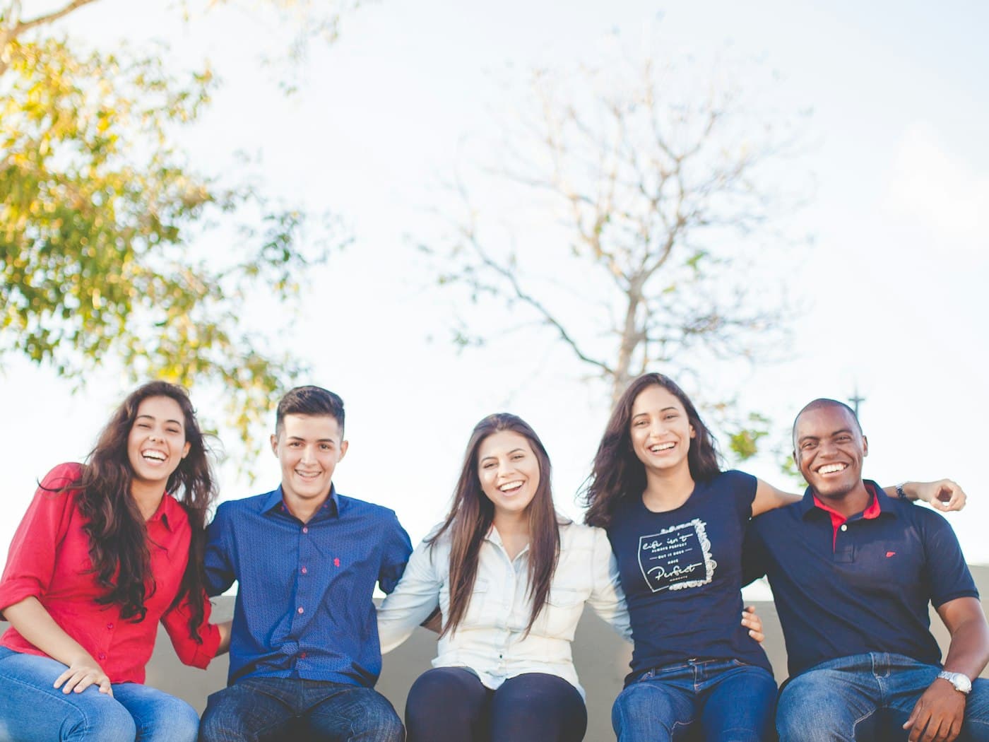 A group of sixth-form students together outdoors